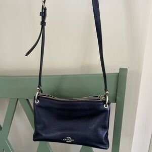 Coach crossbody bag, perfect for running errands.